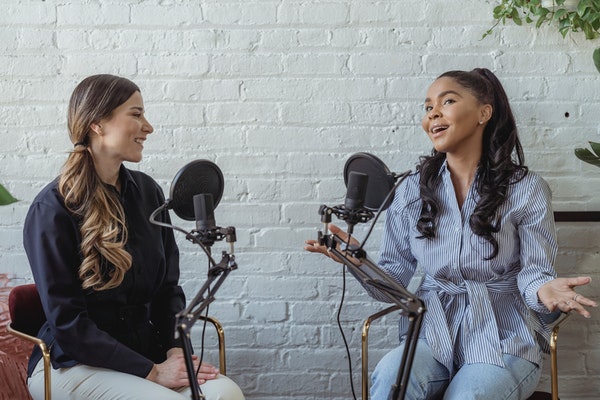 Two women making podcasts