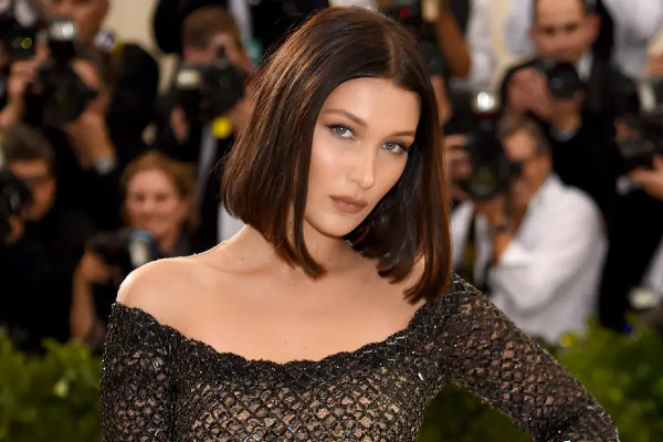 Bella Hadid appears braless in red carpet to support free the nipple movement.